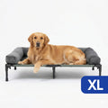 Elevated dog bed with cooling mesh and removable plush side support.